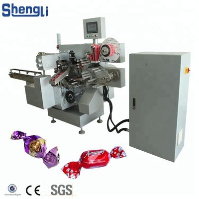 Horizontale Doppeldreh-Süßigkeitenverpackungsmaschine mit 300 ppm Geschwindigkeit 2960*1560*2150 MM